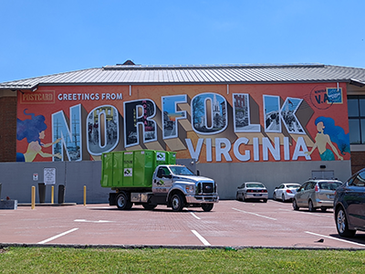 Dumpster rental in front of Norfolk Mural